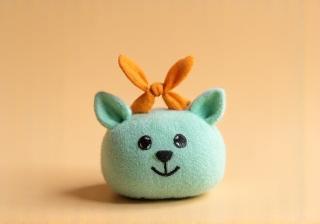 Example of a charming, simple finished craft item like a small keycharm or decorative tag